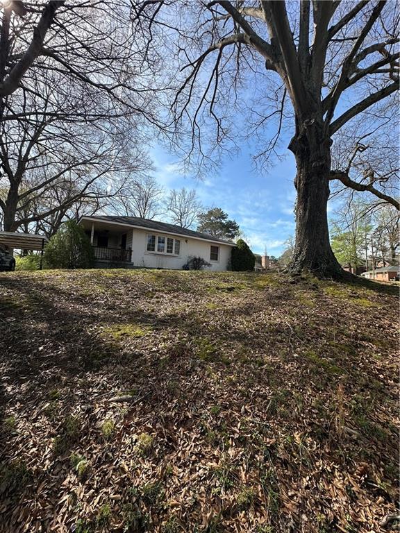 2484 Sylvan Terrace Atlanta, GA 30344 - Photo 1 of 1 a view of house with large trees