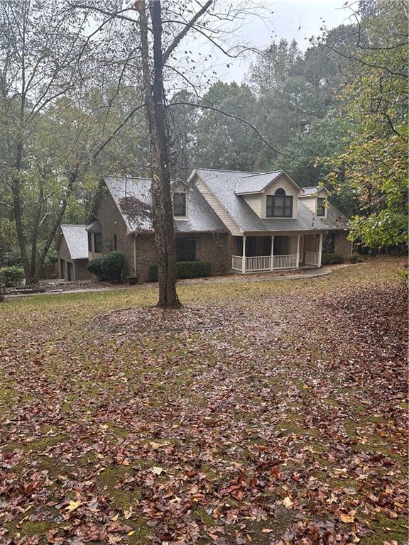 34 Deer Trail Stockbridge, GA 30281 - Photo 1 of 44 front view of a house with a yard
