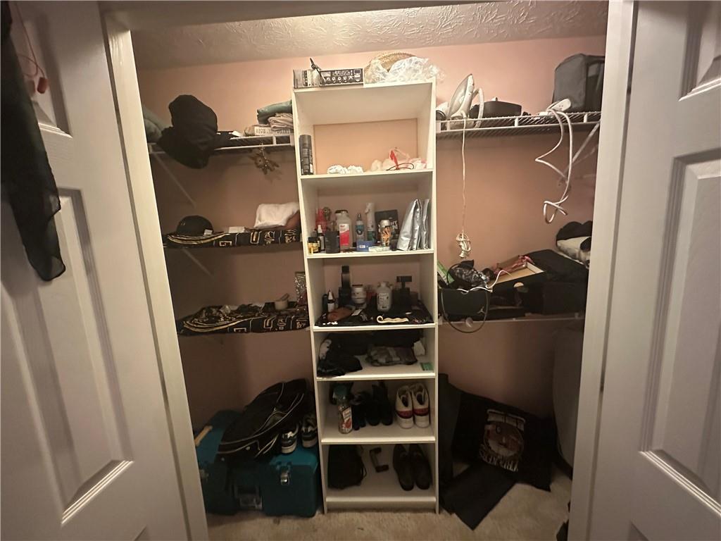 34 Deer Trail Stockbridge, GA 30281 - Photo 14 of 44 a view of walk in closet