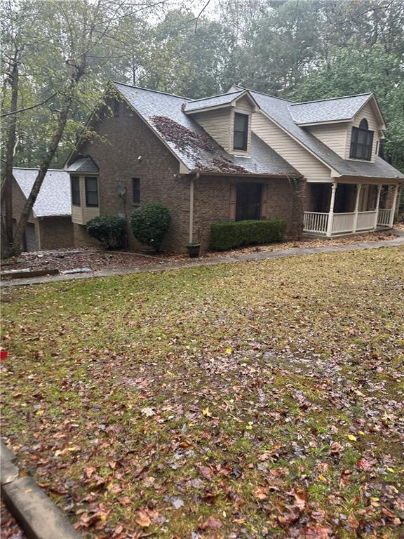 34 Deer Trail Stockbridge, GA 30281 - Photo 2 of 44 a front view of a house with garden