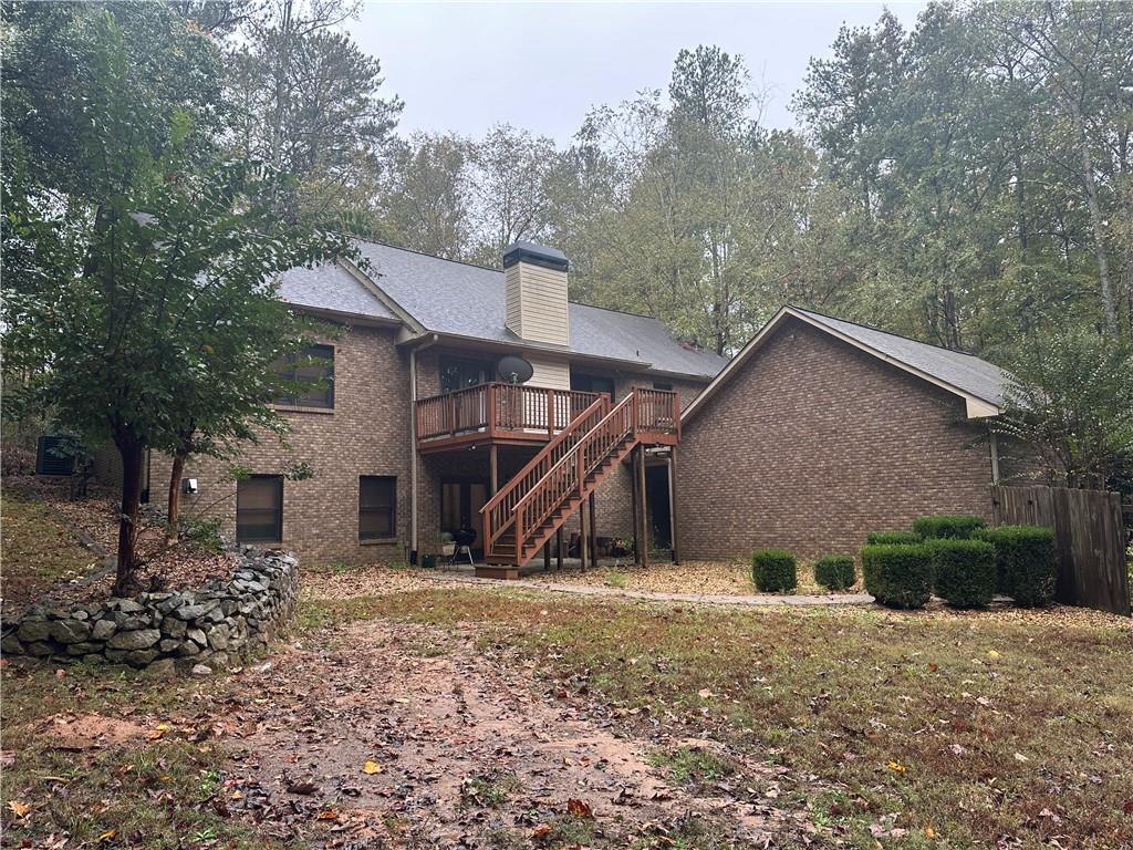 34 Deer Trail Stockbridge, GA 30281 - Photo 23 of 44 a view of a house with a yard and sitting area