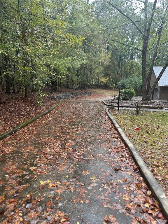 34 Deer Trail Stockbridge, GA 30281 - Photo 3 of 44 a view of a backyard with large trees