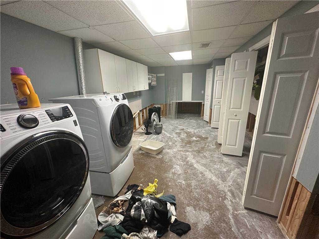 34 Deer Trail Stockbridge, GA 30281 - Photo 40 of 44 a utility room with sink dryer and washer