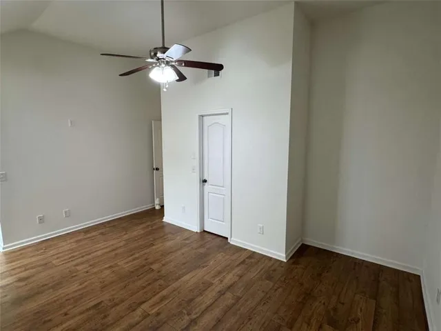 a view of a livingroom with wooden floor