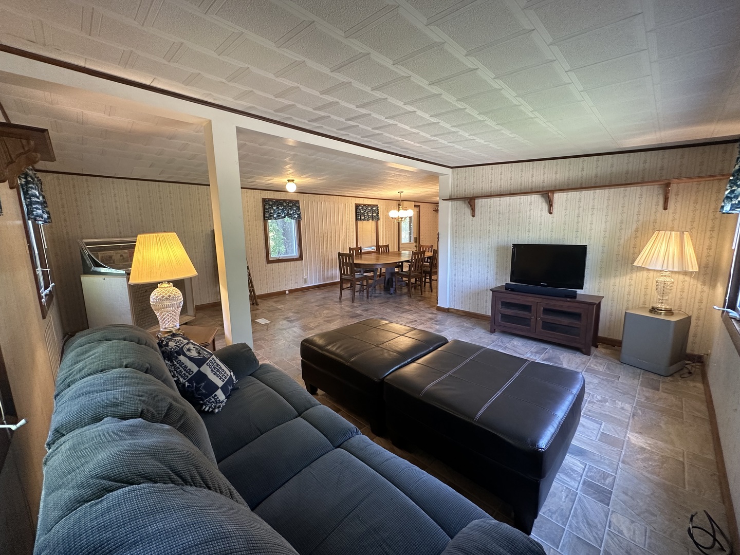 13629 Garden Plain Road Morrison, IL 61270 - Photo 14 of 28 a living room with furniture and a flat screen tv