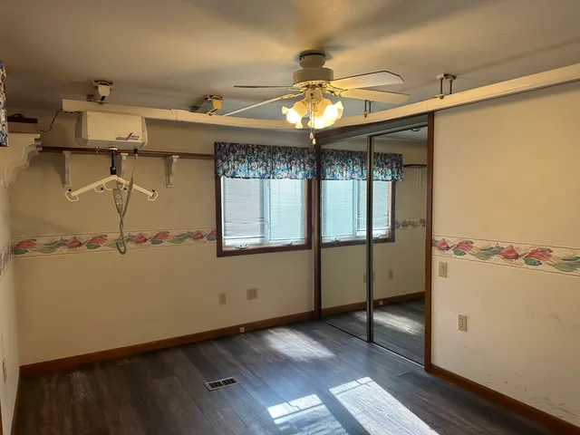 en empty room with windows