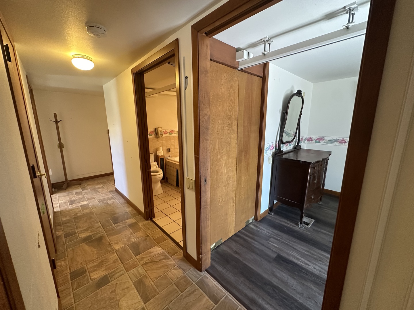 13629 Garden Plain Road Morrison, IL 61270 - Photo 26 of 28 a view of a hallway with wooden floor and staircase