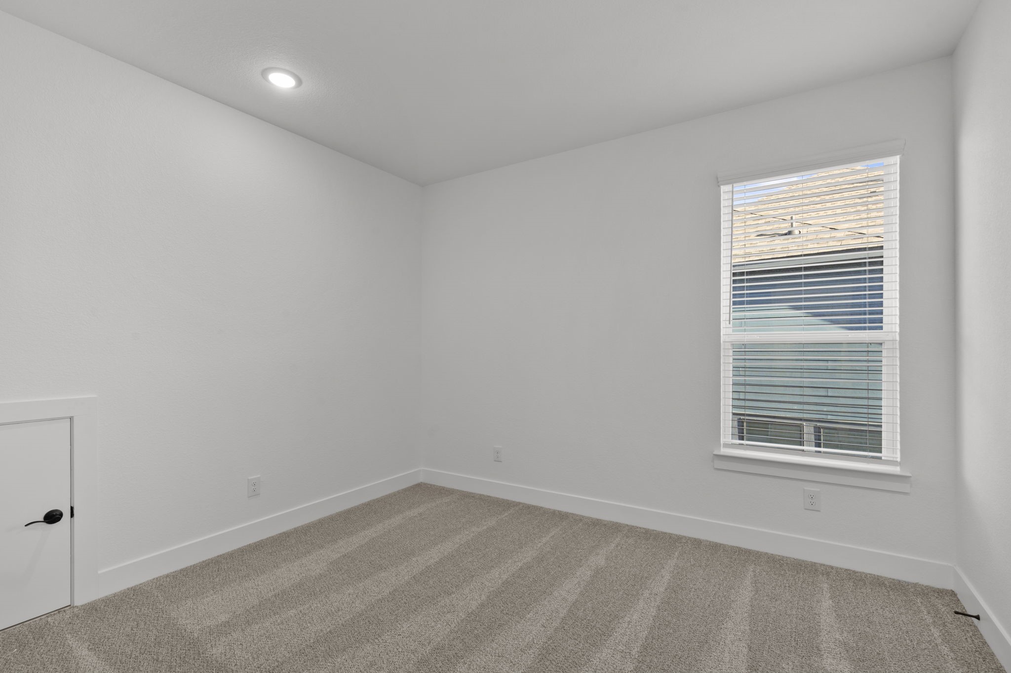 32414 Violet Dancer Court Fulshear, TX 77441 - Photo 38 of 50 a view of an empty room with a window