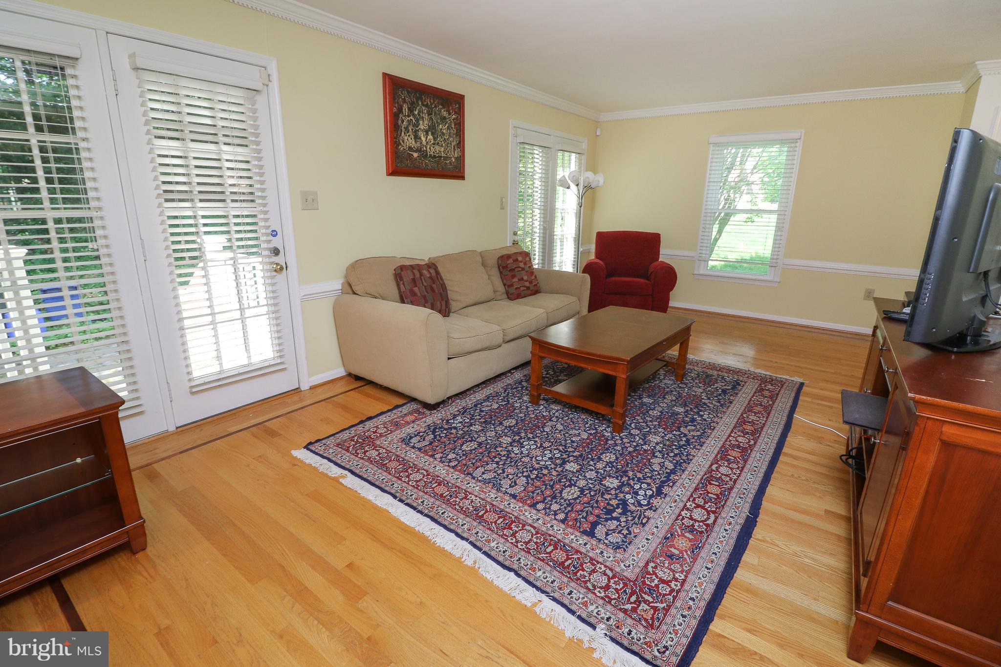7281 Olde Lantern Way Springfield, VA 22152 - Photo 11 of 30 Living Room with French Doors