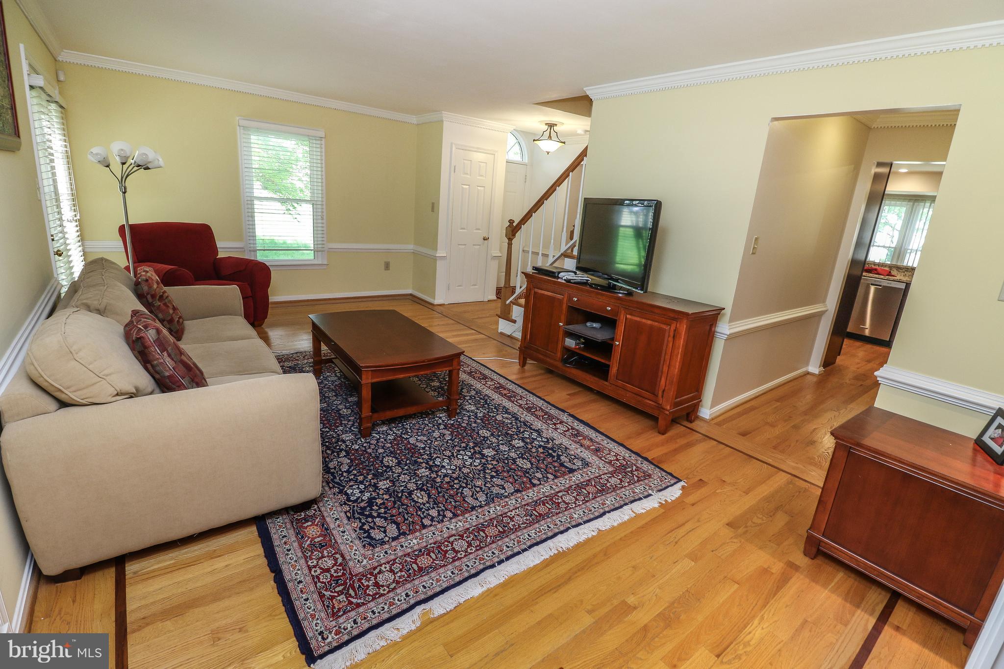 7281 Olde Lantern Way Springfield, VA 22152 - Photo 10 of 30 Living Room with Crown Molding
