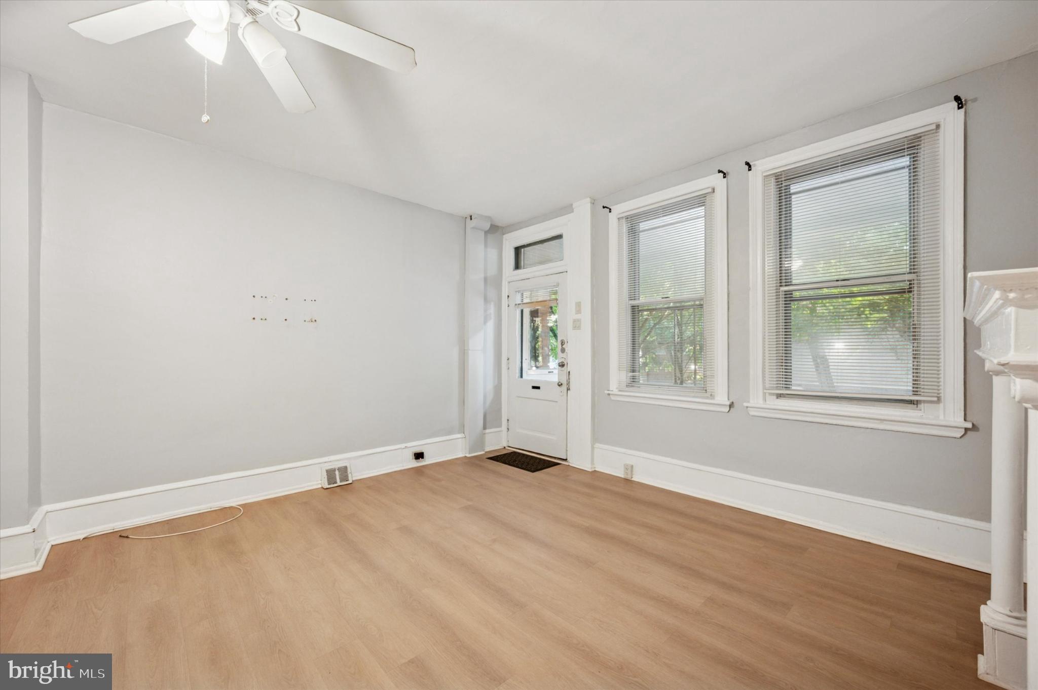 4817 Ridge Avenue Philadelphia, PA 19129 - Photo 20 of 34 an empty room with wooden floor and windows