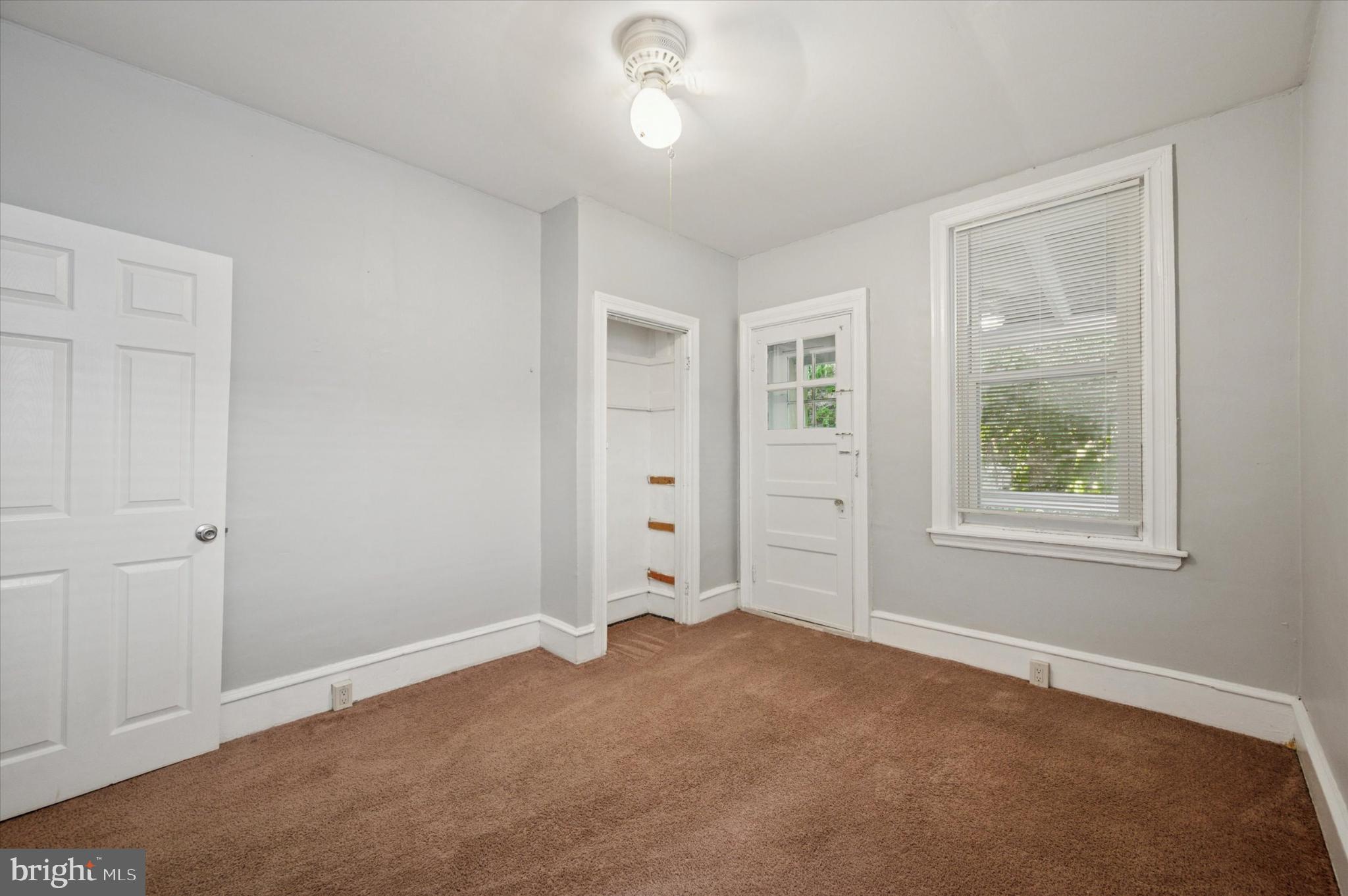 4817 Ridge Avenue Philadelphia, PA 19129 - Photo 28 of 34 an empty room with windows and closet