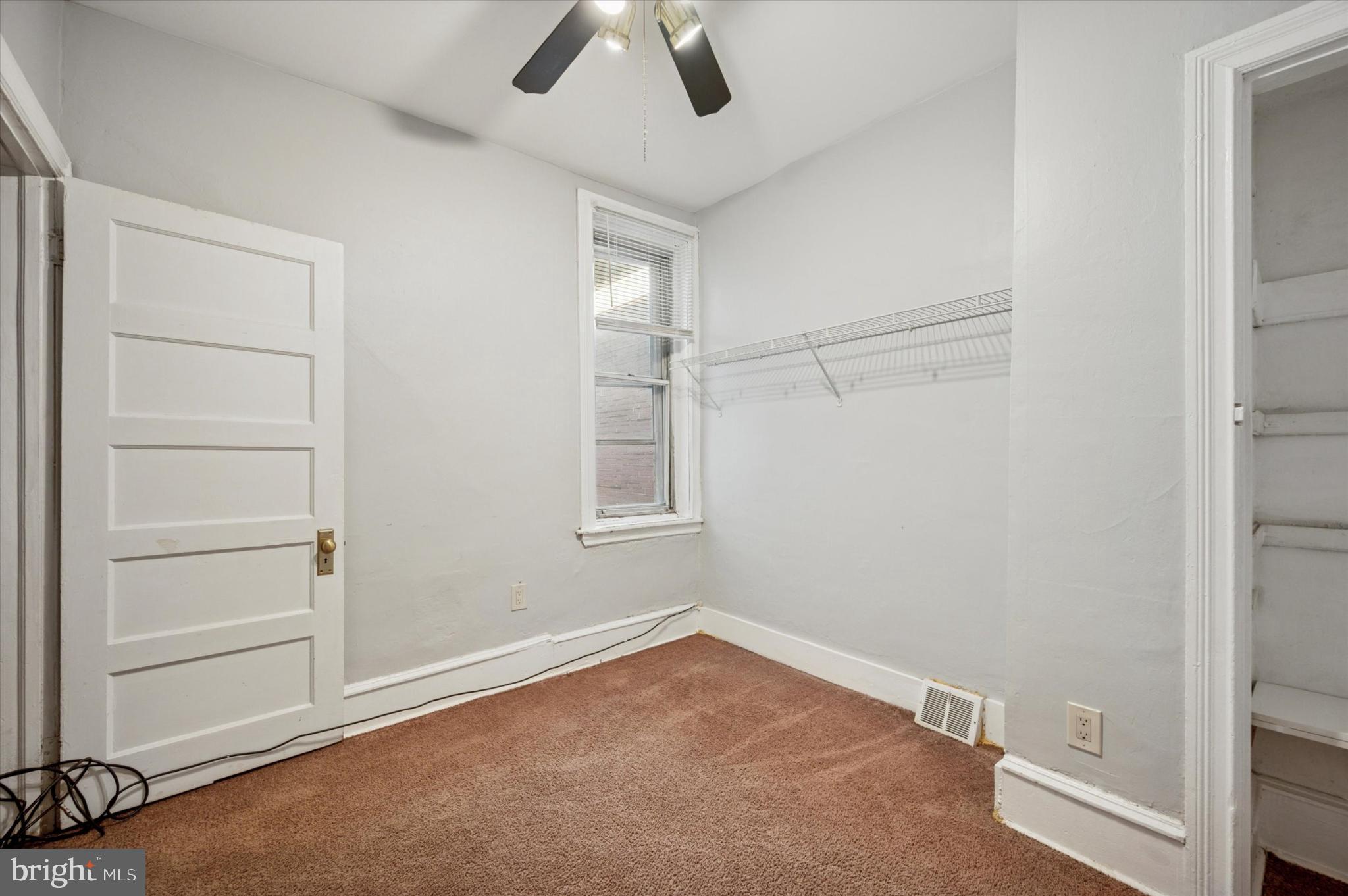 4817 Ridge Avenue Philadelphia, PA 19129 - Photo 32 of 34 an empty room with a empty space and windows