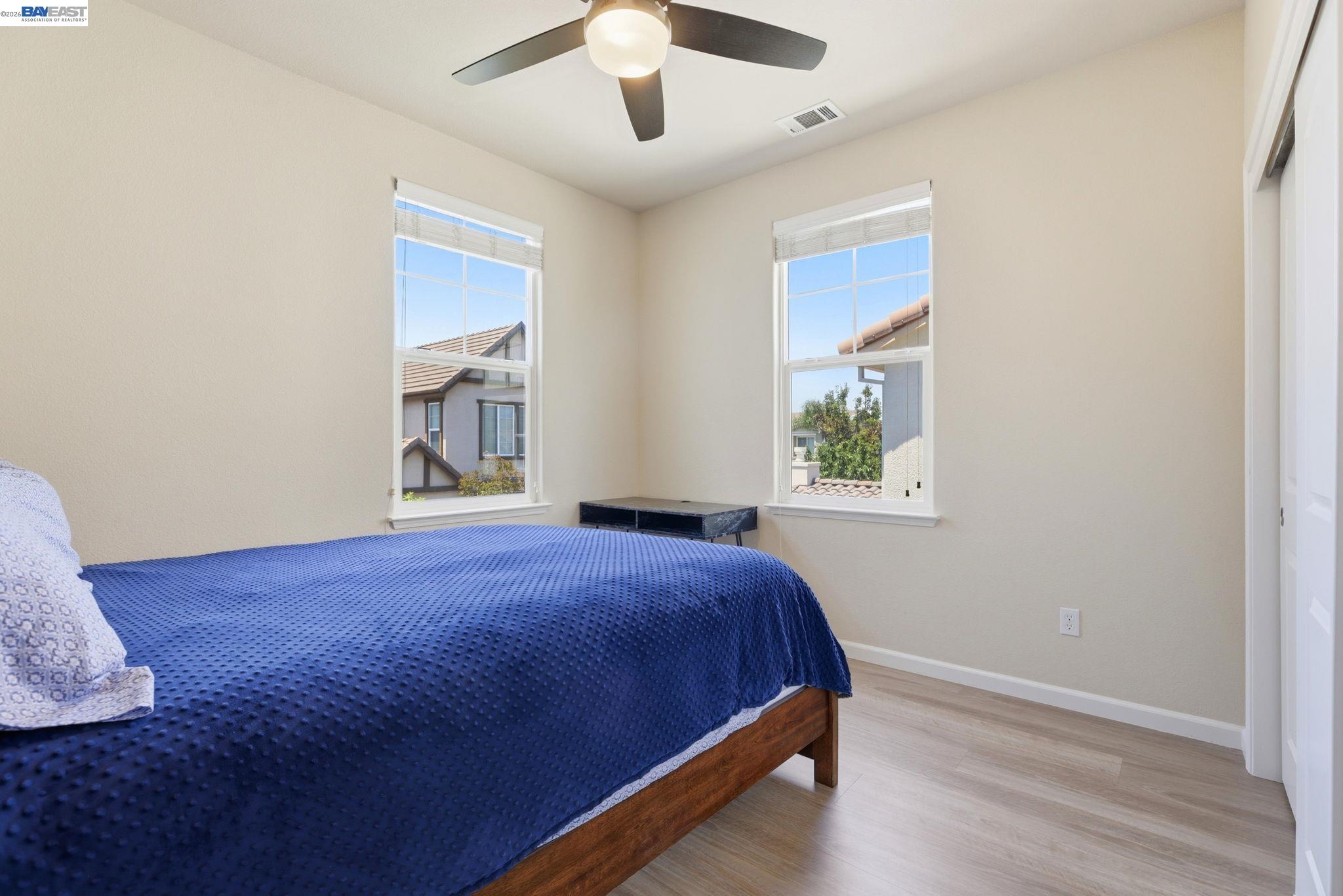 5029 Queensbury Way San Ramon, CA 94582 - Photo 24 of 58 a bedroom with a bed and a window