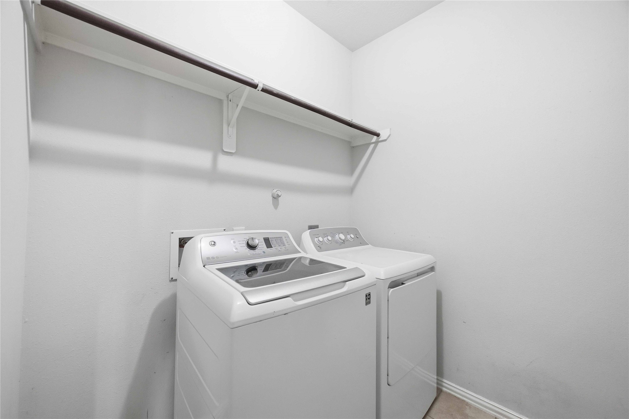 803 Northridge Terrace Lane Spring, TX 77373 - Photo 21 of 42 a utility room with dryer and washer