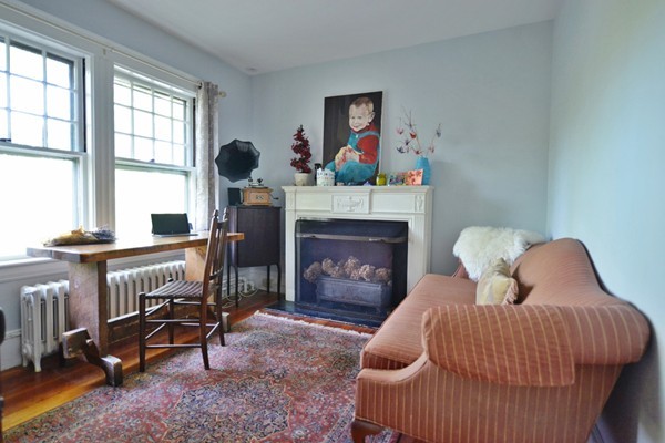 185 Weston Road Wellesley, MA 02482 - Photo 8 of 11 a bedroom with furniture and a fireplace