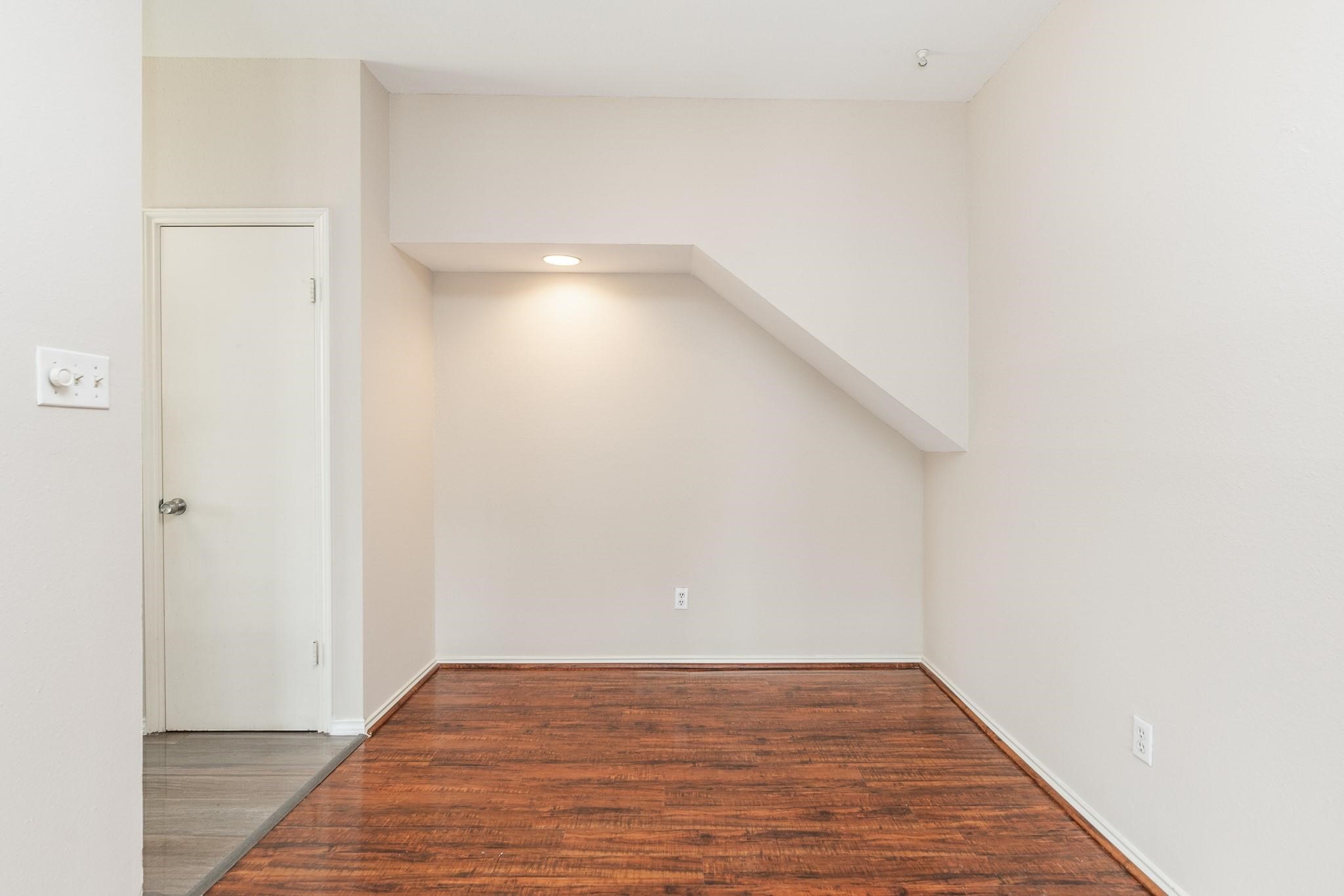 2023 Gentryside Drive, Unit 508 Houston, TX 77077 - Photo 19 of 41 a view of an empty room with wooden floor