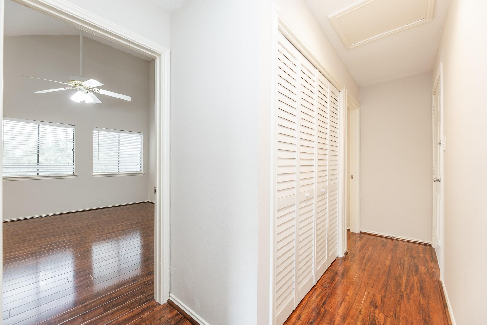 2023 Gentryside Drive, Unit 508 Houston, TX 77077 - Photo 26 of 41 a view of an empty room with wooden floor and a window