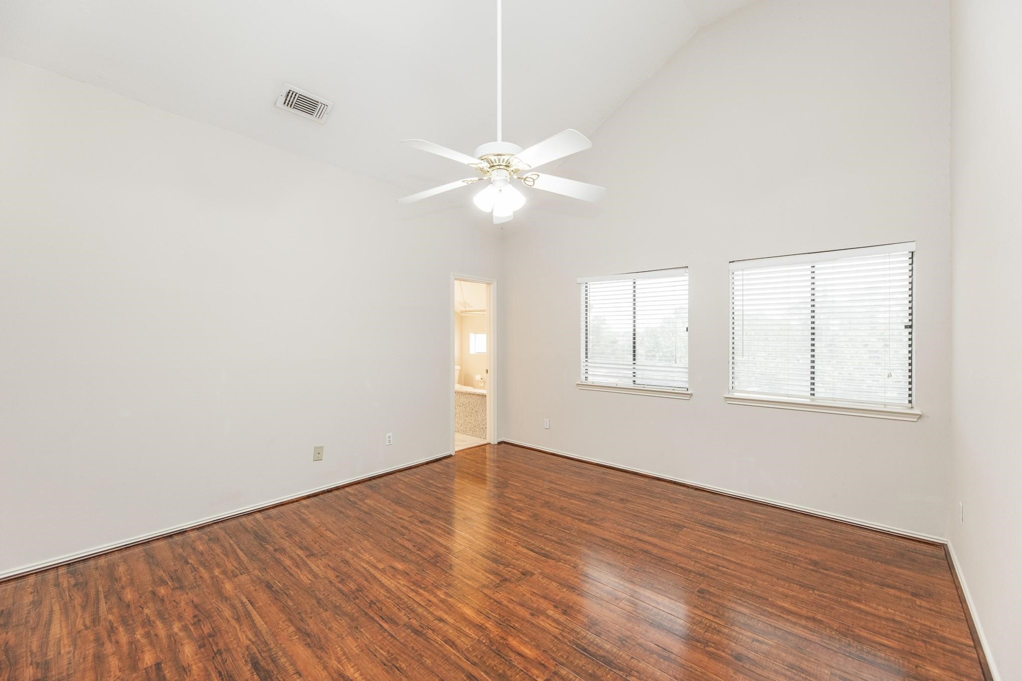 2023 Gentryside Drive, Unit 508 Houston, TX 77077 - Photo 28 of 41 wooden floor in an empty room with a window