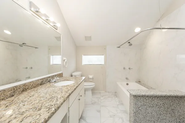 a bathroom with a bathtub