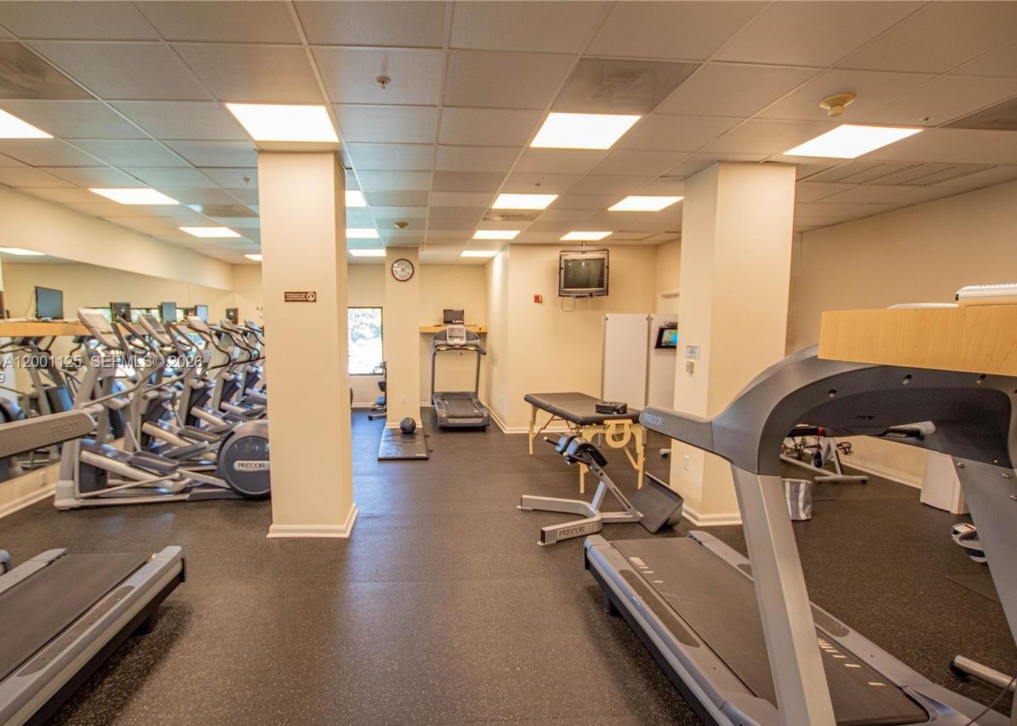2333 Brickell Avenue, Unit 1803 Miami, FL 33129 - Photo 14 of 23 a view of a room with gym equipment