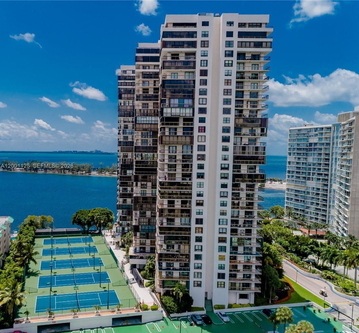 2333 Brickell Avenue, Unit 1803 Miami, FL 33129 - Photo 2 of 23 a picture of building with glass windows