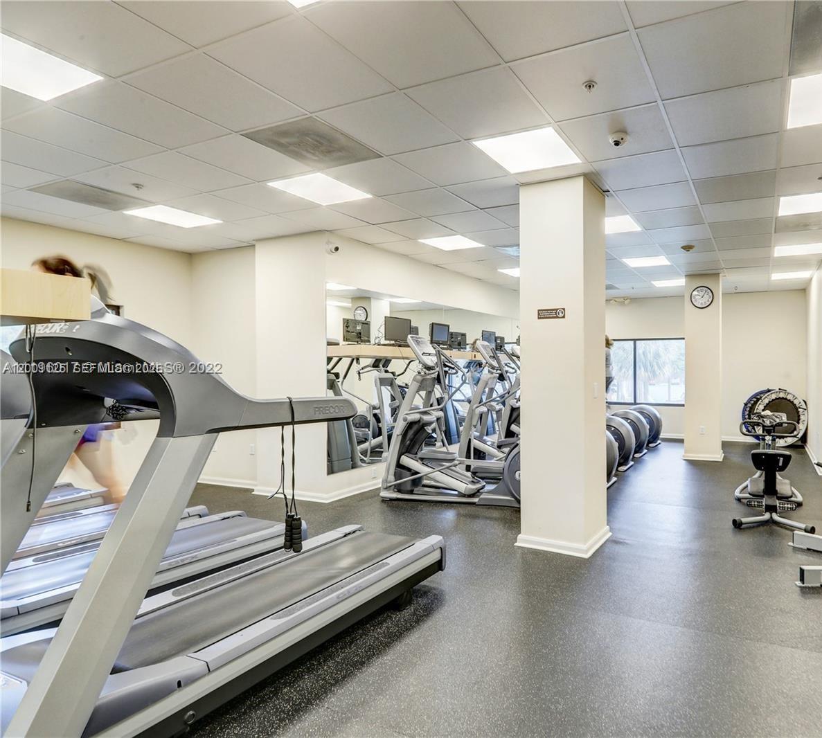2333 Brickell Avenue, Unit 1803 Miami, FL 33129 - Photo 10 of 23 a view of a room with gym equipment