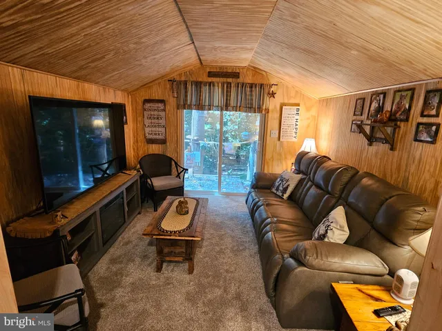 a large kitchen with stainless steel appliances granite countertop a stove and a sink