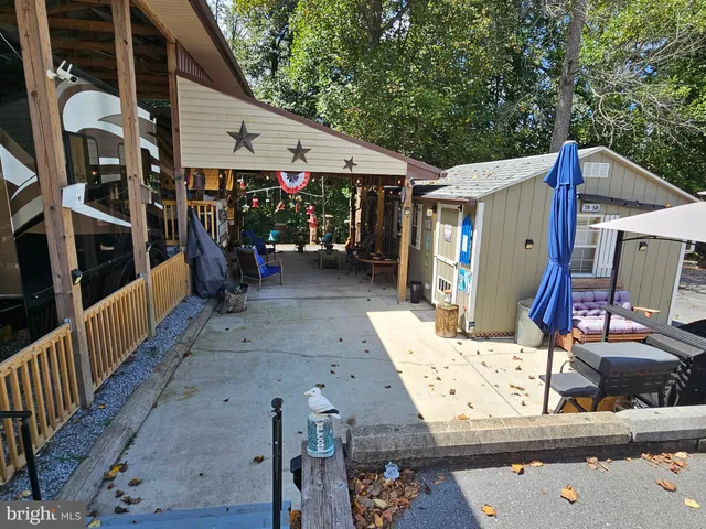 a view of street with sitting area
