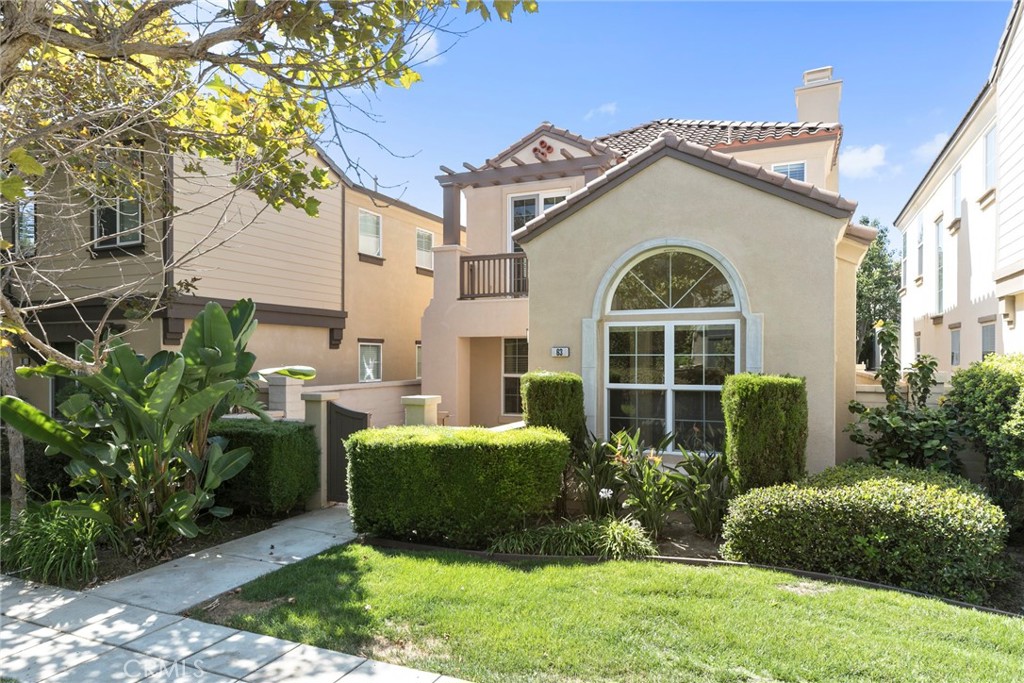 63 Figtree Irvine, CA 92603 - Photo 1 of 14 a view of a house with a garden