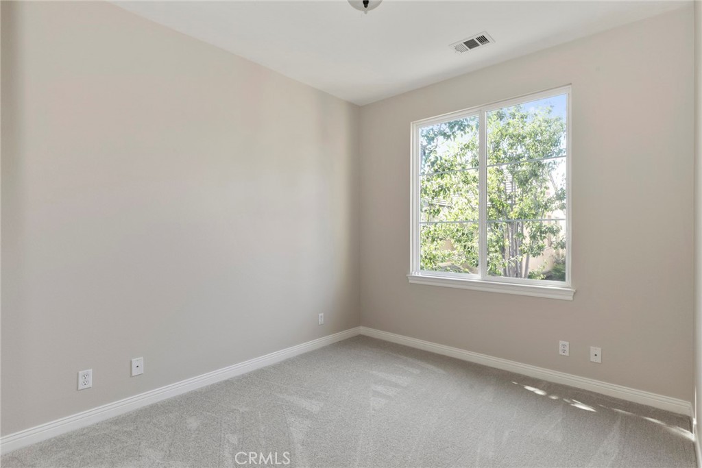 63 Figtree Irvine, CA 92603 - Photo 14 of 14 an empty room with windows