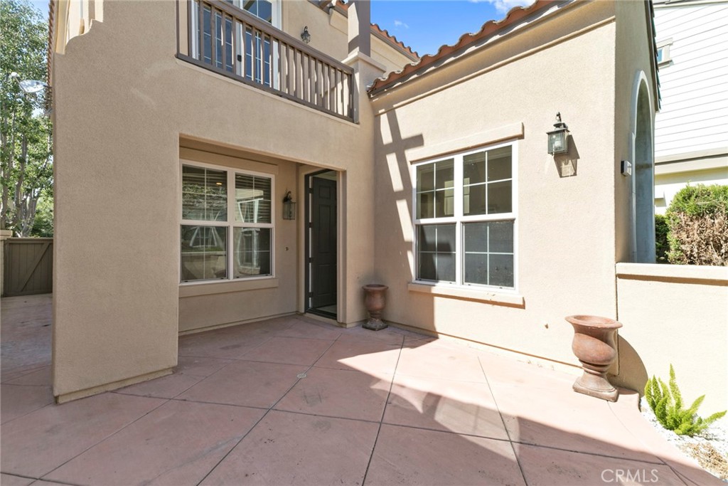 63 Figtree Irvine, CA 92603 - Photo 8 of 14 a view of a house with a large window