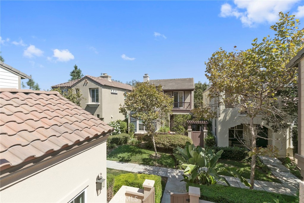 63 Figtree Irvine, CA 92603 - Photo 10 of 14 a view of a house with a yard