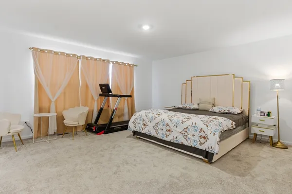 a bathroom with double sink and a mirror