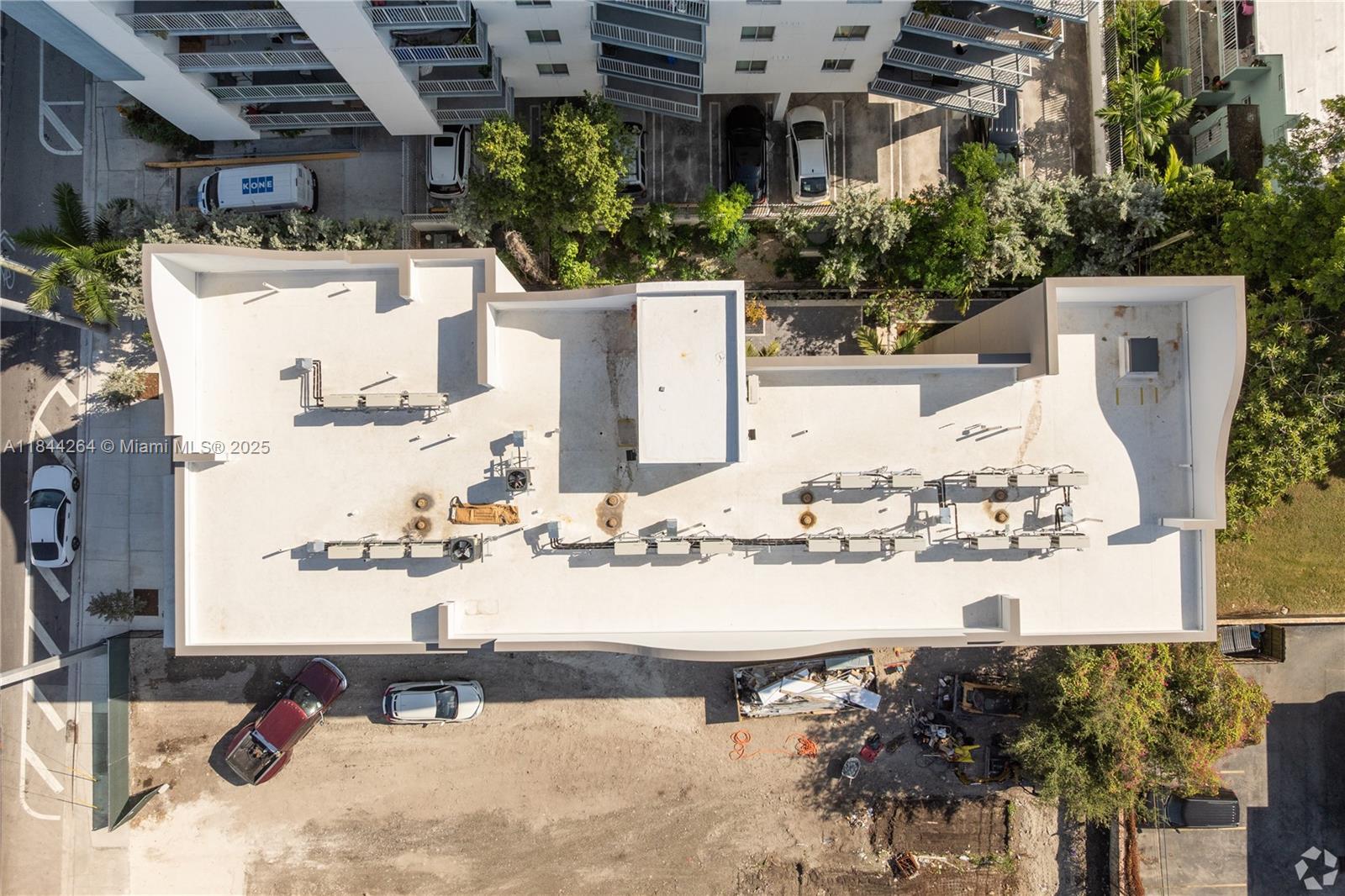 650 Southwest 1st Street, Unit 203 Miami, FL 33130 - Photo 15 of 15 a view of balcony with two chairs and potted plants