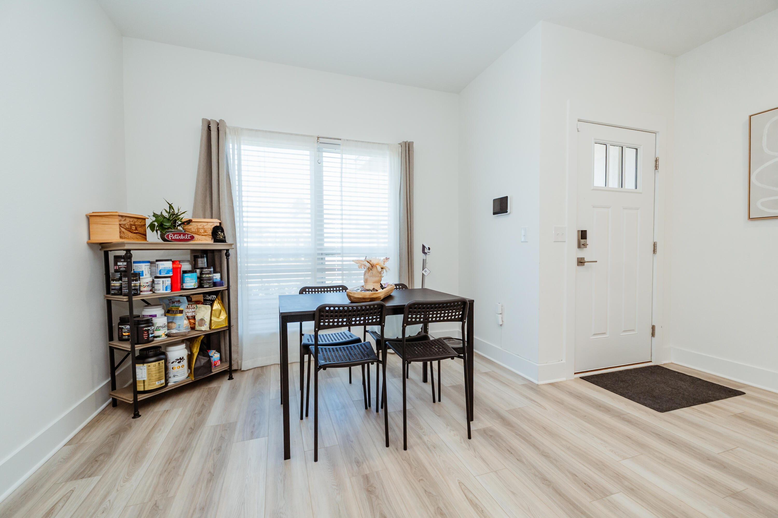 231 Lyla Lane Crestview, FL 32539 - Photo 12 of 27 a view of a workspace with furniture and wooden floor