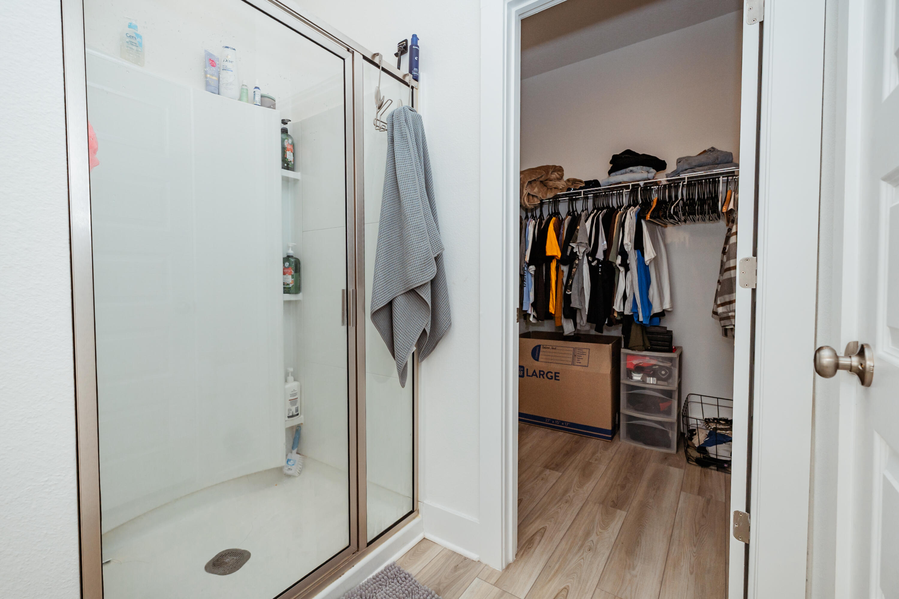 231 Lyla Lane Crestview, FL 32539 - Photo 23 of 27 a view of walk in closet with clothes and shoes