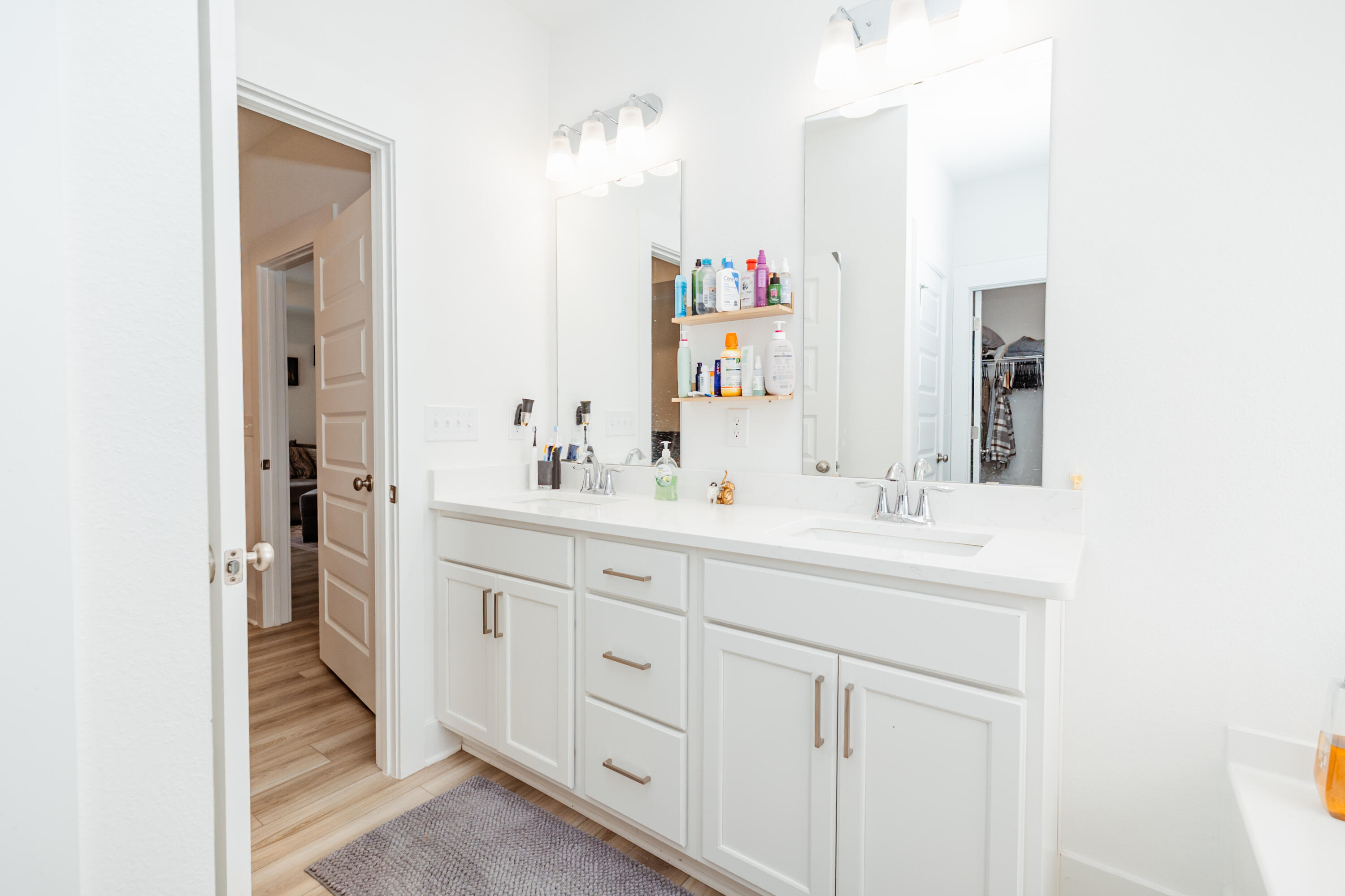 231 Lyla Lane Crestview, FL 32539 - Photo 24 of 27 a bathroom with a sink and a mirror