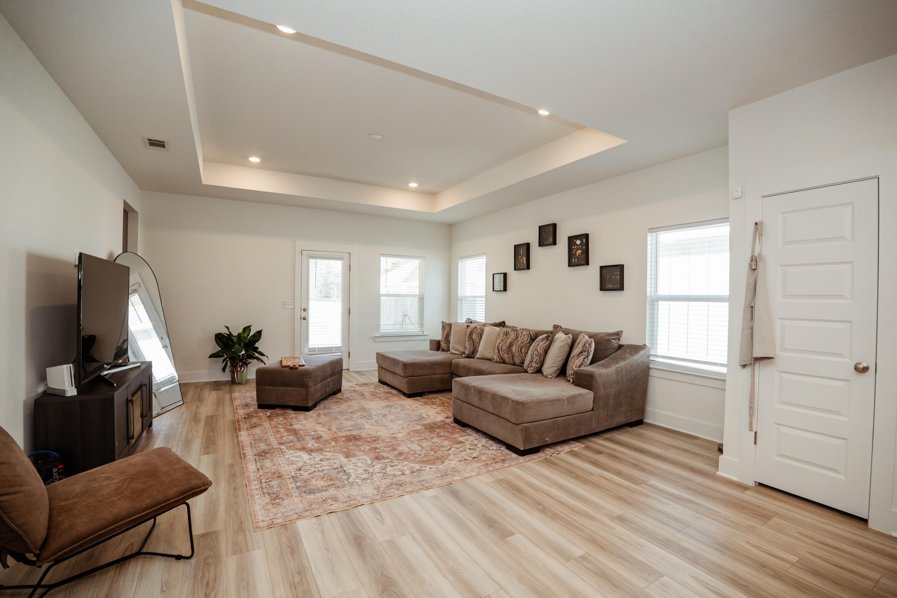 231 Lyla Lane Crestview, FL 32539 - Photo 5 of 27 a living room with furniture and a flat screen tv