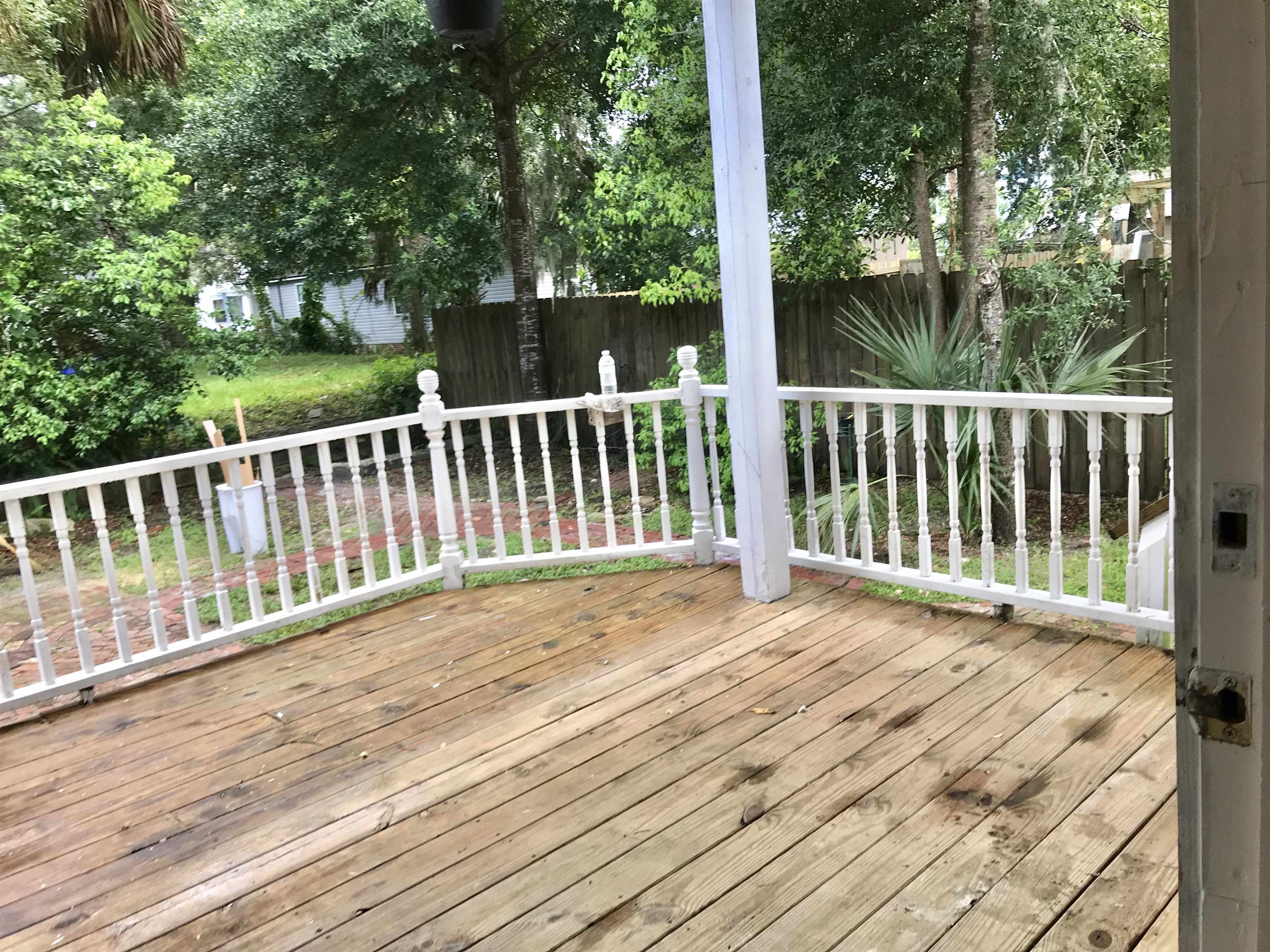 25 Desoto Place St. Augustine, FL 32084 - Photo 4 of 8 a view of a wooden deck