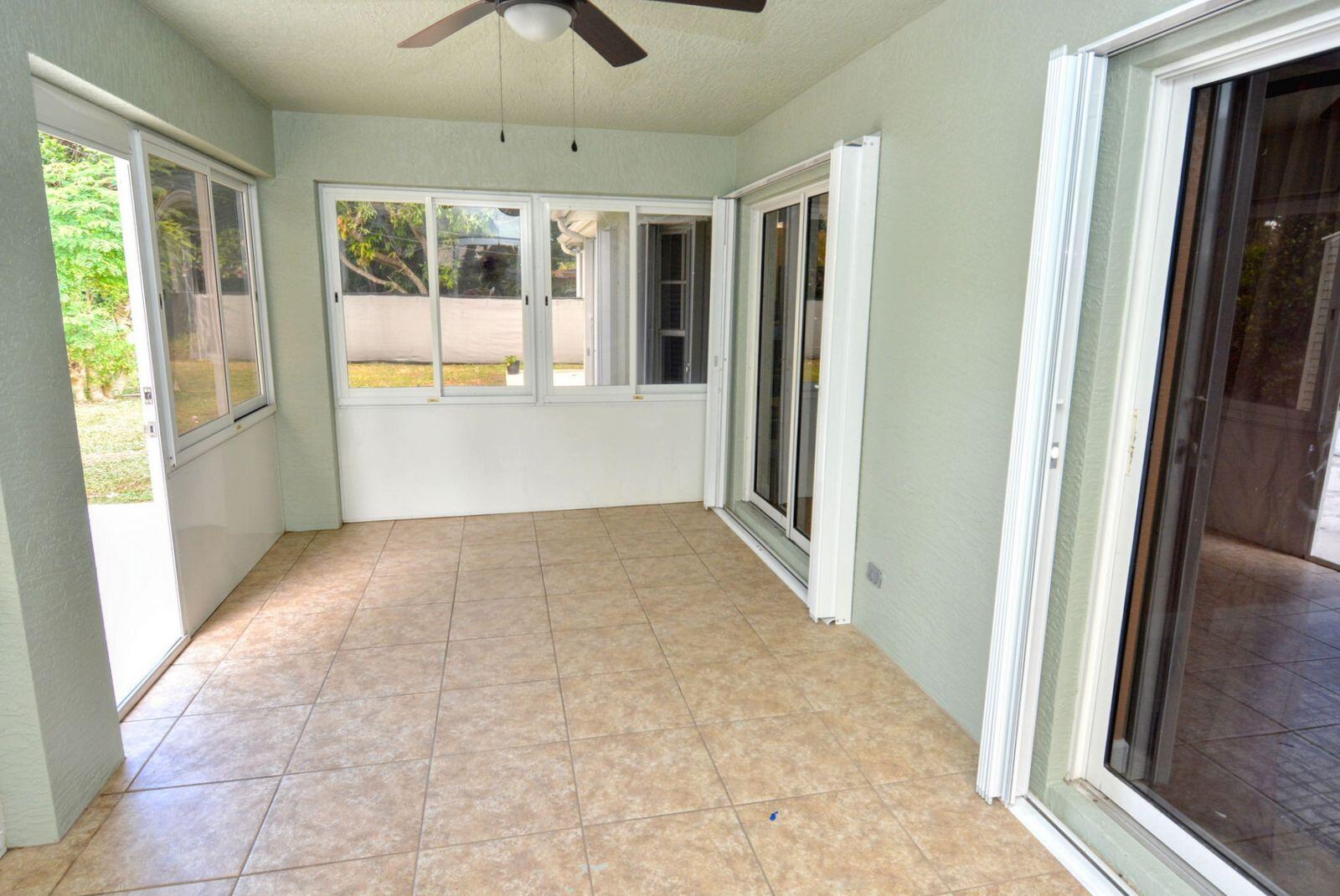 220 West Arbor Avenue Port St. Lucie, FL 34952 - Photo 26 of 32 a view of hallway with windows