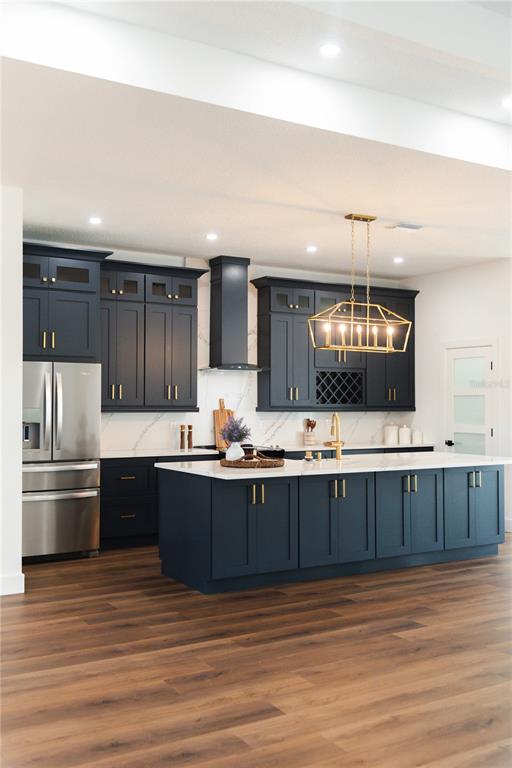 15364 Newport Road Clearwater, FL 33764 - Photo 15 of 50 a kitchen with stainless steel appliances granite countertop a sink and a stove