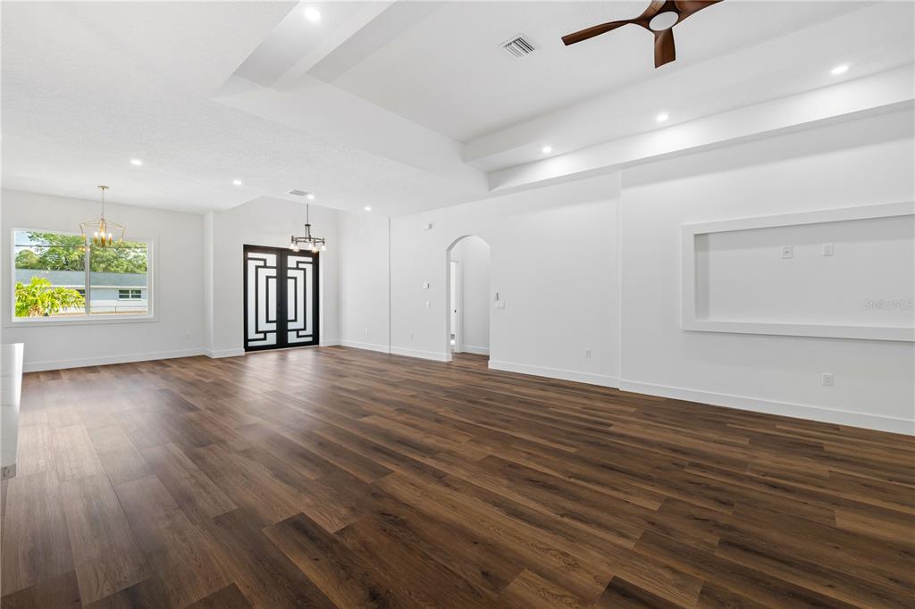 15364 Newport Road Clearwater, FL 33764 - Photo 27 of 50 a view of an empty room with window and wooden floor
