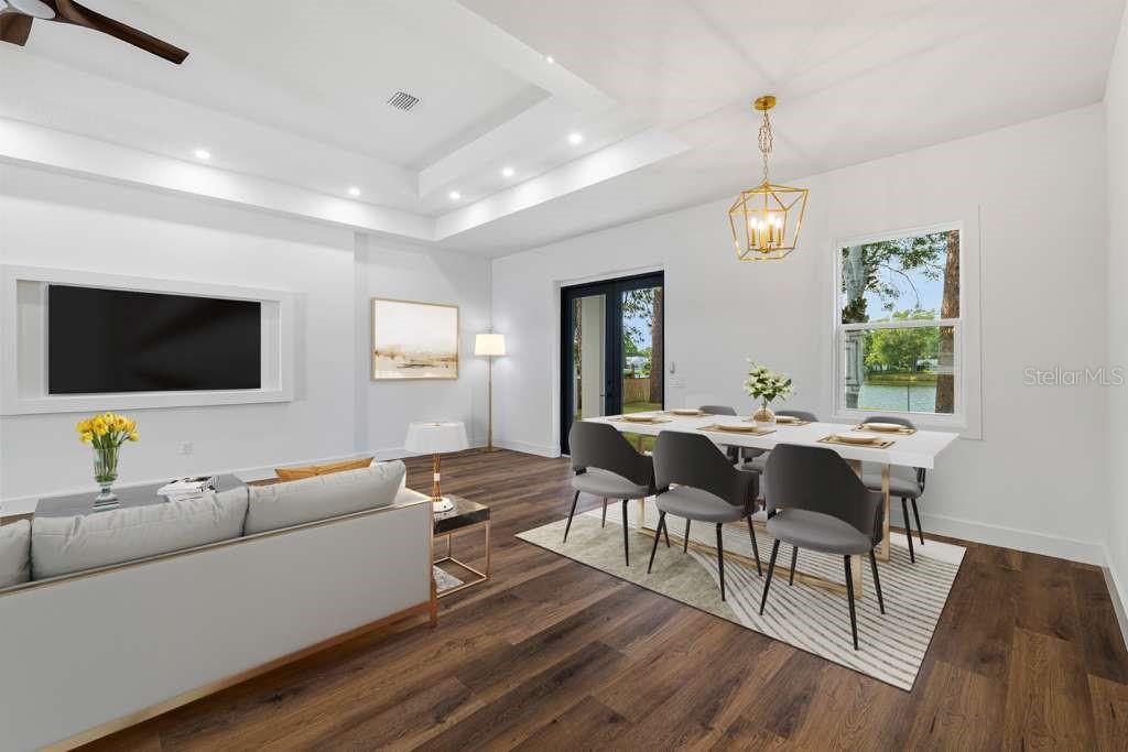 15364 Newport Road Clearwater, FL 33764 - Photo 28 of 50 a living room with furniture and a flat screen tv