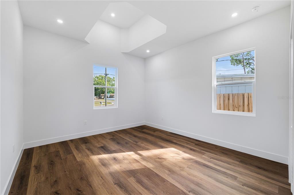 15364 Newport Road Clearwater, FL 33764 - Photo 33 of 50 an empty room with windows