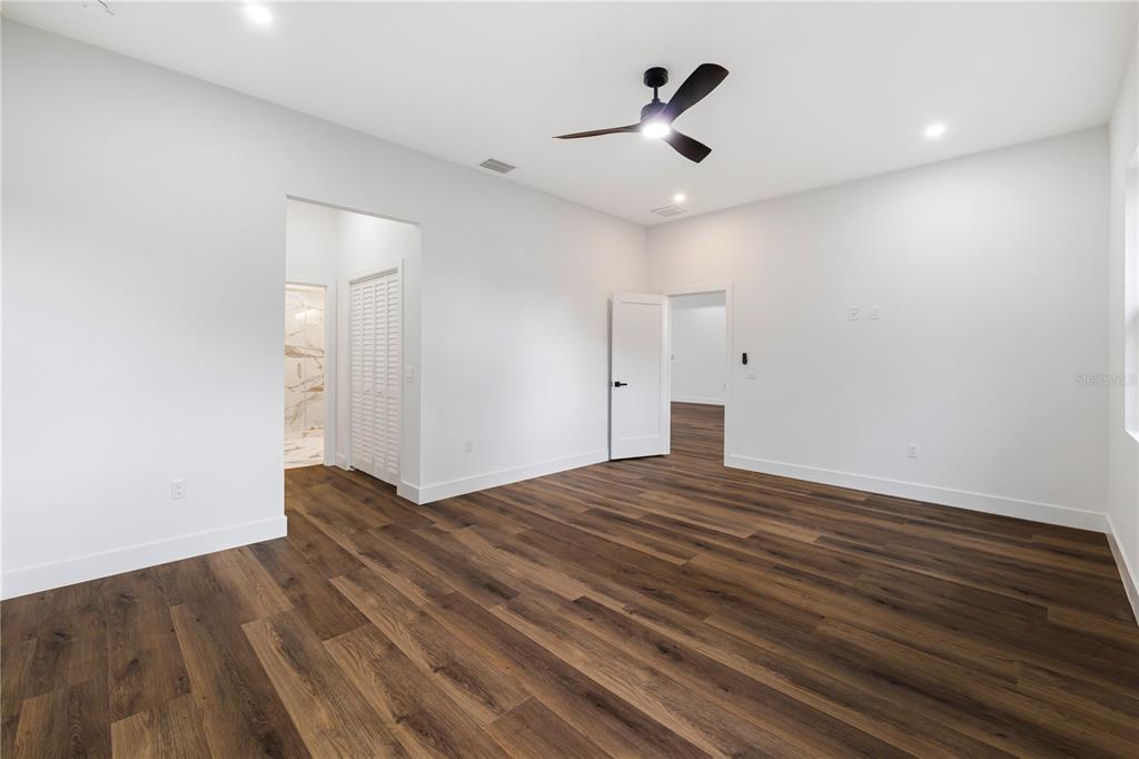 15364 Newport Road Clearwater, FL 33764 - Photo 36 of 50 a view of empty room with wooden floor