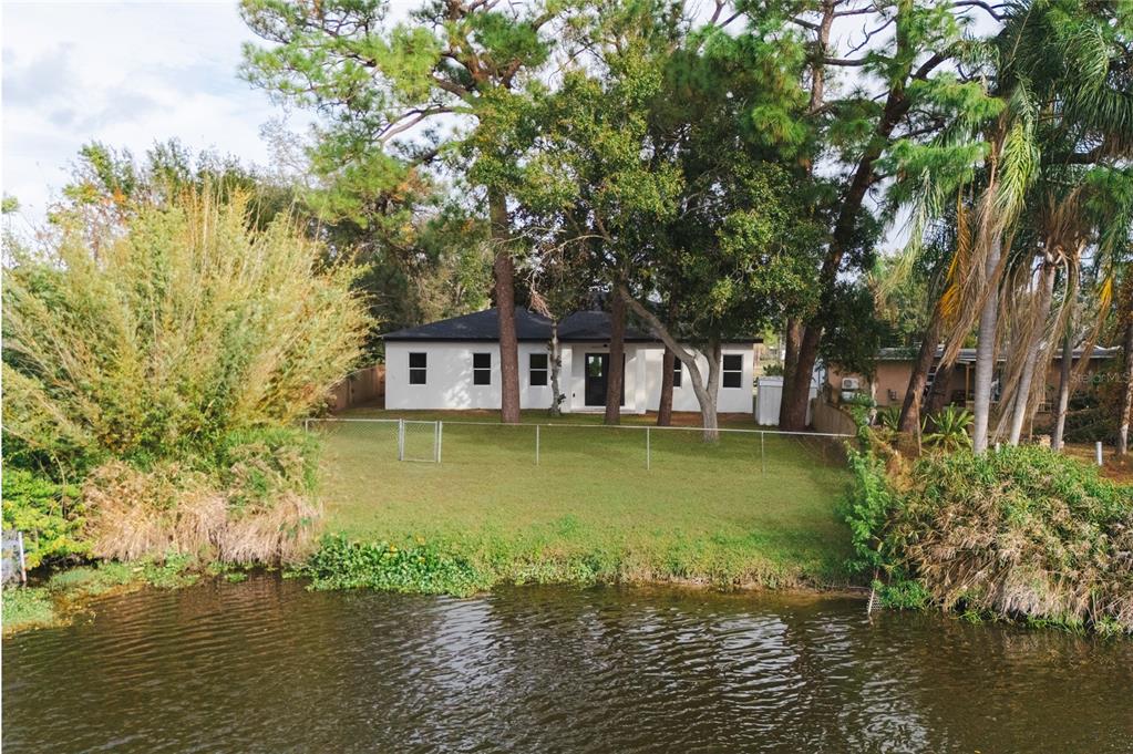 15364 Newport Road Clearwater, FL 33764 - Photo 44 of 50 a house view with swimming pool in front