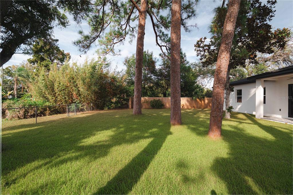 15364 Newport Road Clearwater, FL 33764 - Photo 47 of 50 a view of a house with a yard