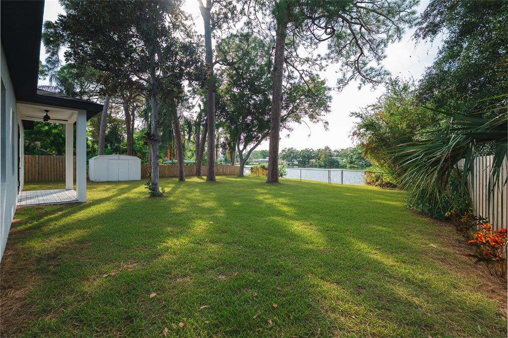 15364 Newport Road Clearwater, FL 33764 - Photo 48 of 50 a view of a house with a backyard