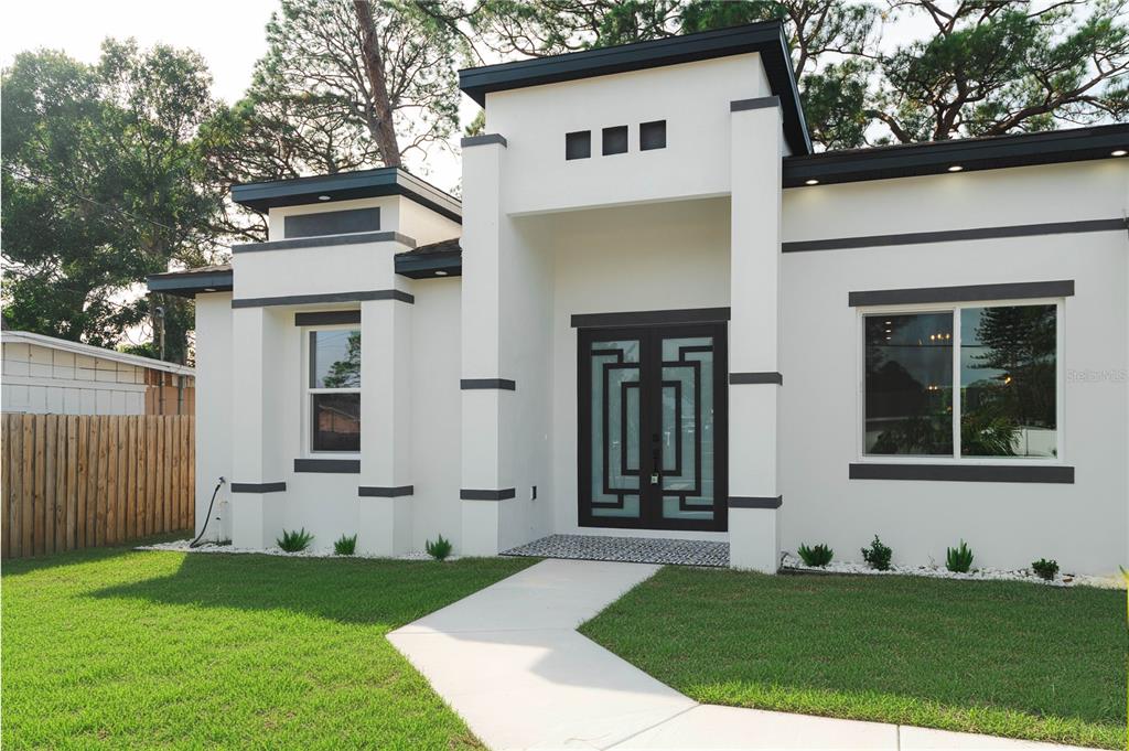 15364 Newport Road Clearwater, FL 33764 - Photo 5 of 50 a view of front of a house with a yard